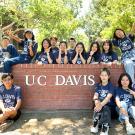 students from Shandong Ag University pose in front of the UC Davis sign for a group photo