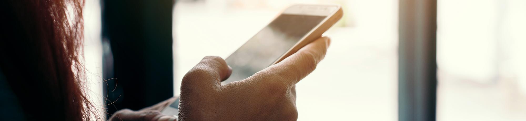 close up of cell phone in hand