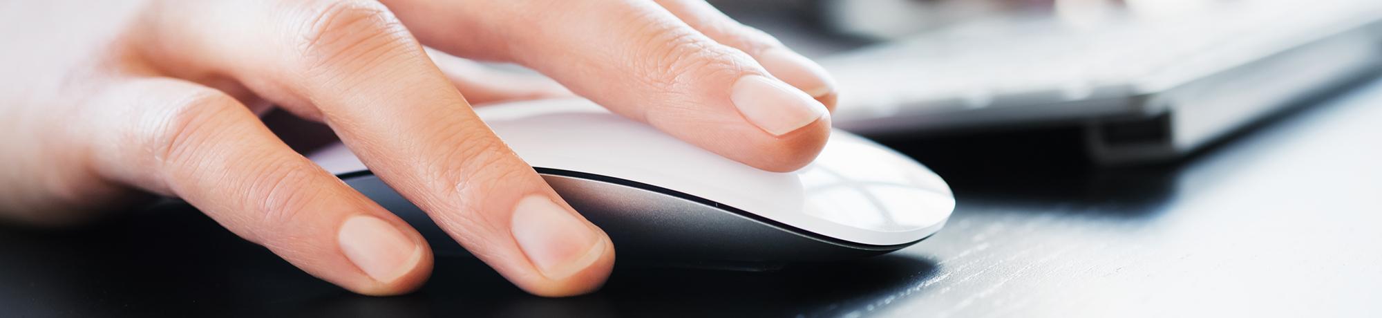 person clicking on mouse