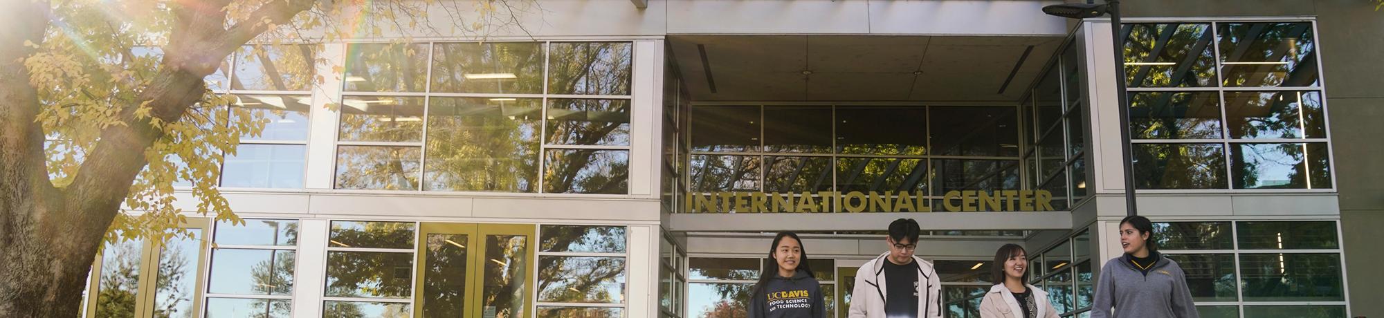 UC Davis students walking in front of the International Center
