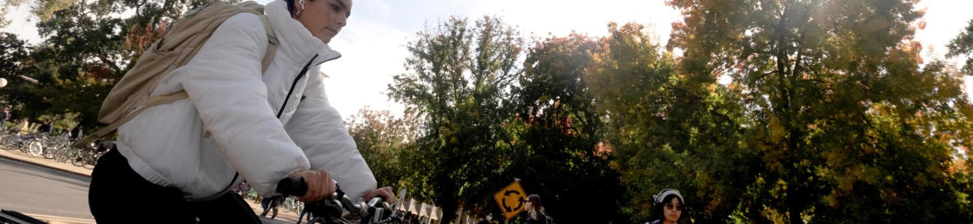 Students ride through the bike circle as they ride across campus