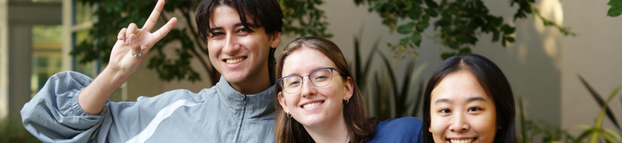 Three UC Davis Global Study Program students pose at the fall 2023 orientation